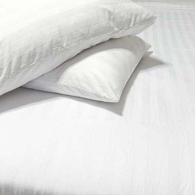 Sábanas y almohadones para hoteles